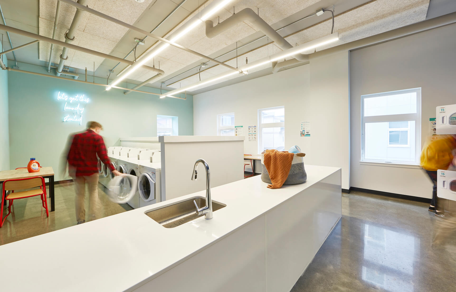 washer and dryer room at stateside apartments